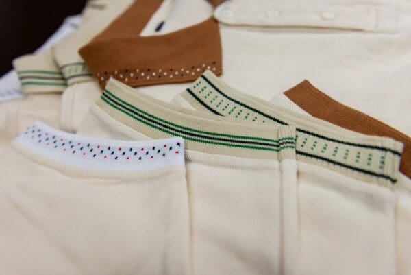 White polo shirts with different collars.